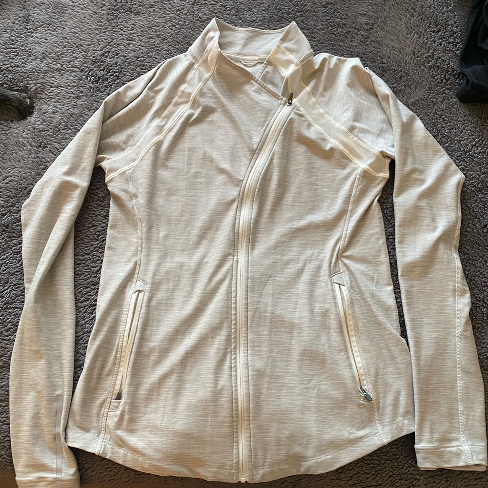 New Balance Anticipate Jacket in Sea Salt Heather